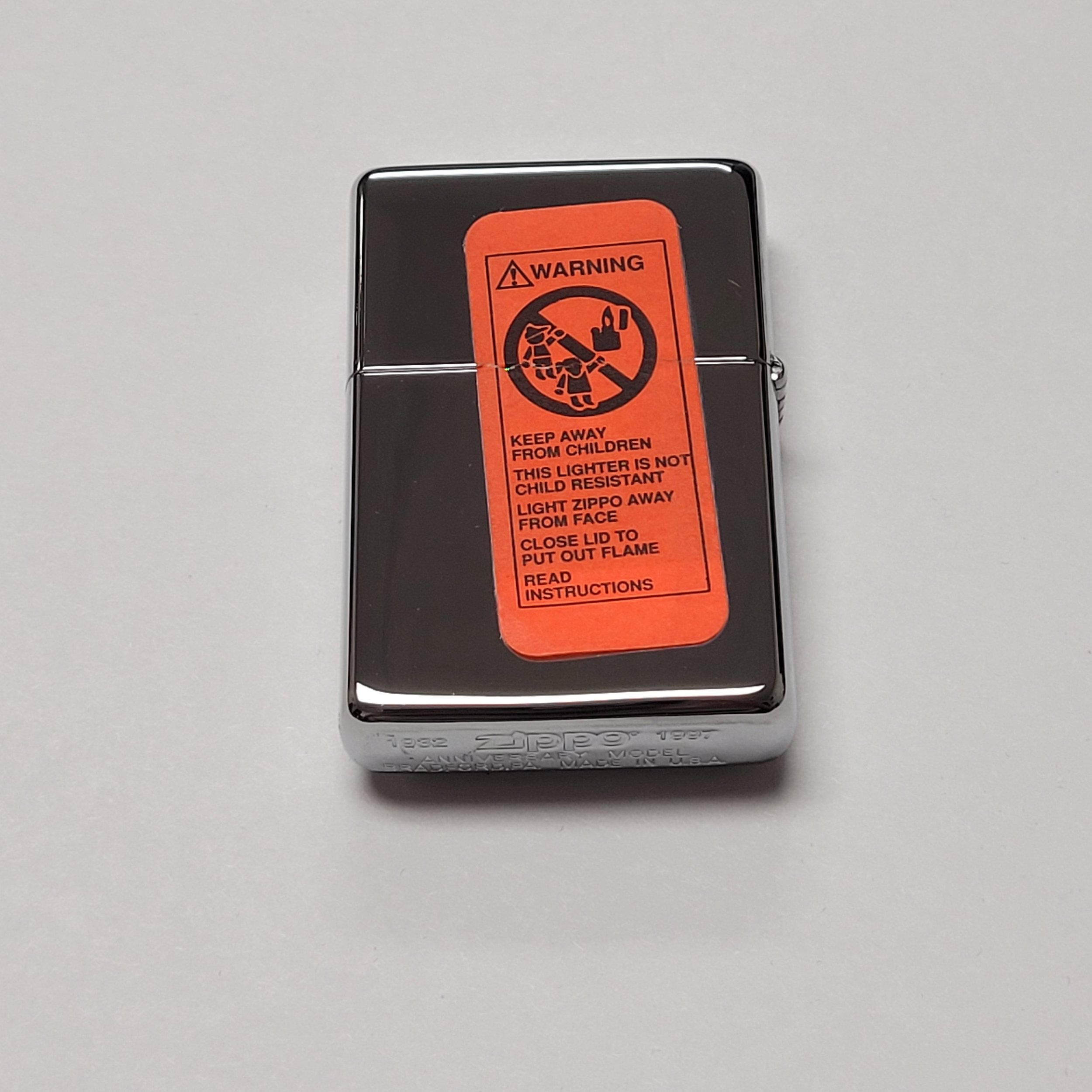 Zippo 1997 Limited Edition Collectible 65th Anniversary — Elegant Lighters :: Selling & repairing high-end and vintage lighters since 1957! – S.T. Dupont, Alfred Dunhill, IM Corona, Zippo, Ronson, Evans Lighters, & Zippo 1997 Limited Edition Collectible 65th Anniversary — Elegant Lighters :: Selling & repairing high-end and vintage lighters since 1957! – S.T. Dupont, Alfred Dunhill, IM Corona, Zippo, Ronson, Evans Lighters, &